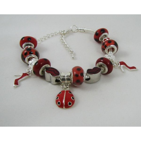 Pulsera de plata con mariquitas rojas